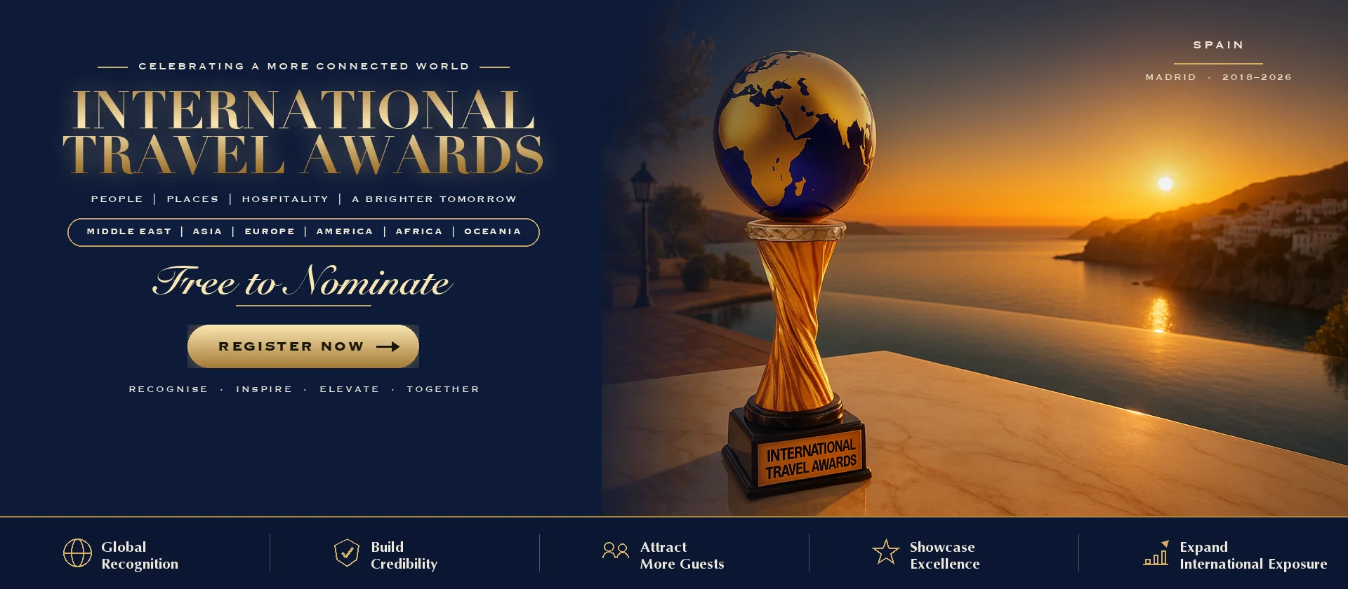 International Travel Awards trophy on a Dubai terrace at sunset with the Spain skyline behind it