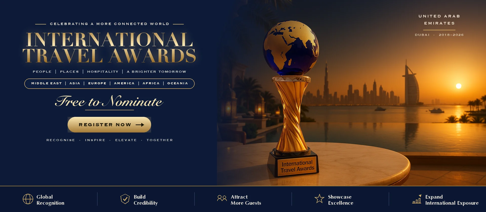 International Travel Awards trophy on a Dubai terrace at sunset with the UAE skyline behind it